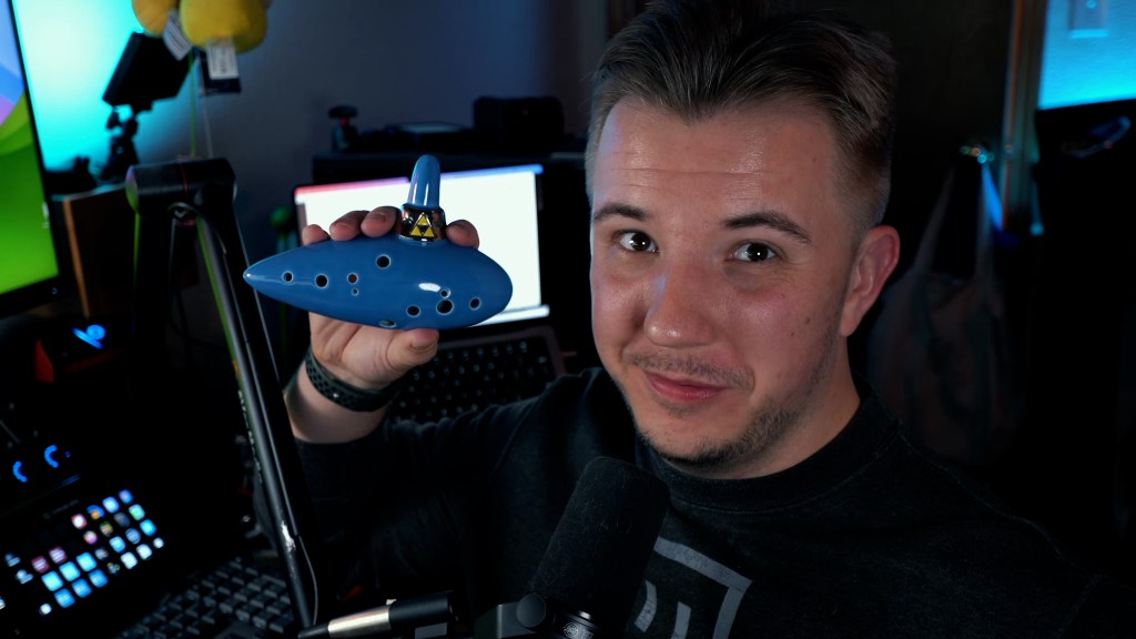 Me holding a Spencer ocarina of time replica